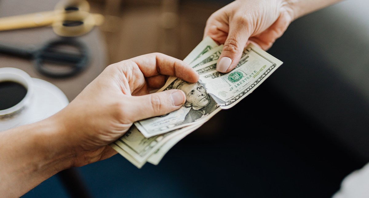 Homeowner consulting with mortgage broker in Baldivis office about using home equity to buy an investment property
